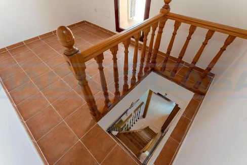 Casa-Adosada-con-Piscina-terazza-Garaje-View-guest-bedroom1-stairs-down-Coin-Magnificasa