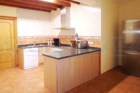 Semi-detached-house-4bedrooms-3bathrooms-terrace-and-pool-nebrales-view-kitchen-downstairs-Magnificasa