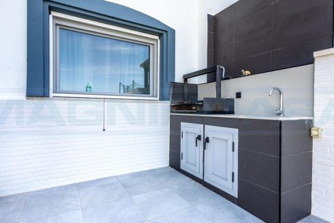 Semi-Detached-Townhouse-3-Bedroom-in-Alhaurin-Golf-view-outdoor-kitchen-BBQ-Magnificasa